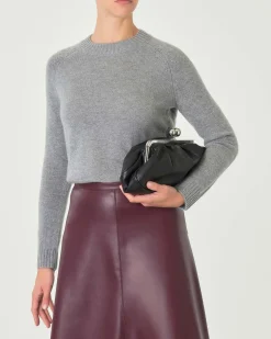 Maglia grigio melange in cashmere con scollo tondo e spacchetti laterali