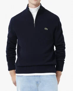 Maglia Lacoste blu in lambswool di pura lana a collo alto e apertura a mezza zip