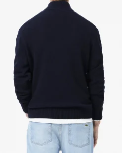 Maglia Lacoste blu in lambswool di pura lana a collo alto e apertura a mezza zip