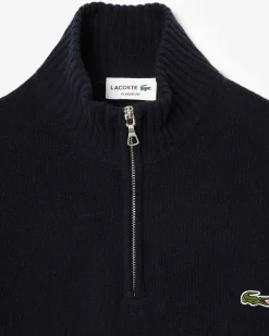 Maglia Lacoste blu in lambswool di pura lana a collo alto e apertura a mezza zip