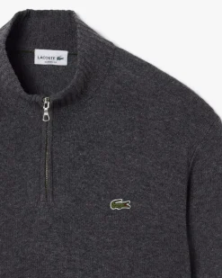 Maglia Lacoste grigio antracite in lambswool di pura lana a collo alto e apertura a mezza zip