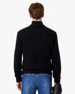 Maglia Lacoste nera in lambswool di pura lana a collo alto e apertura a mezza zip