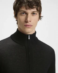 Maglia nera in pura lana vergine con pannello lavorato e chiusura zip a doppio cursore