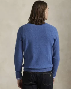 Maglia Polo Ralph Lauren celeste in pura lana con scollo a giro e logo pony in tono ricamato sul petto