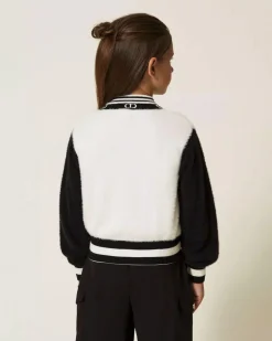 Maglia Twinset bianca e nera effetto pelosetto con zip e loghi monogram
