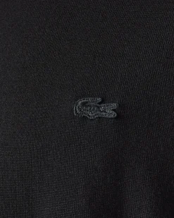 Maglioncino Lacoste nero girocollo in pura lana merinos