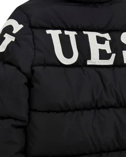 Maxi piumino Guess in nylon nero trapuntato con cappuccio e maxi logo bianco sul retro