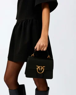 Mini Love Bag Top Handle Light nera Pinko in pelle liscia a forma a trapezio con fibbia Love Birds e tracolla a catena