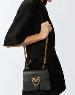 Mini Love Bag Top Handle Light nera Pinko in pelle liscia a forma a trapezio con fibbia Love Birds e tracolla a catena