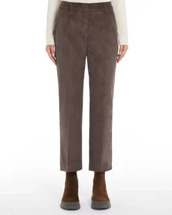 Pantaloni a trombetta marroni in velluto millerighe di cotone stretch a vita alta con piega stirata