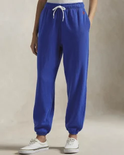 Pantaloni blu royal in felpa di cotone garzato con elastico al fondo e logo rosso ricamato