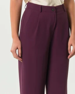 Pantaloni bordeaux Hlo! in crèpe effetto fluido con pinces in vita