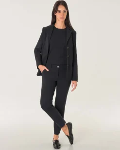 Pantaloni slim neri in tessuto tecnico lunghezza alla caviglia con spacchetti laterali