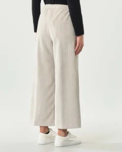 Pantaloni super wide neri Jurerê in velluto stretch a coste con elastico inserito in vita