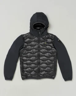 Piumino Blauer nero in nylon trapuntato a onde con cappuccio e maniche in soft shell
