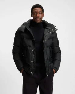 Piumino Boss nero in nylon idrorepellente con motivo monogramma in rilievo e cappuccio staccabile
