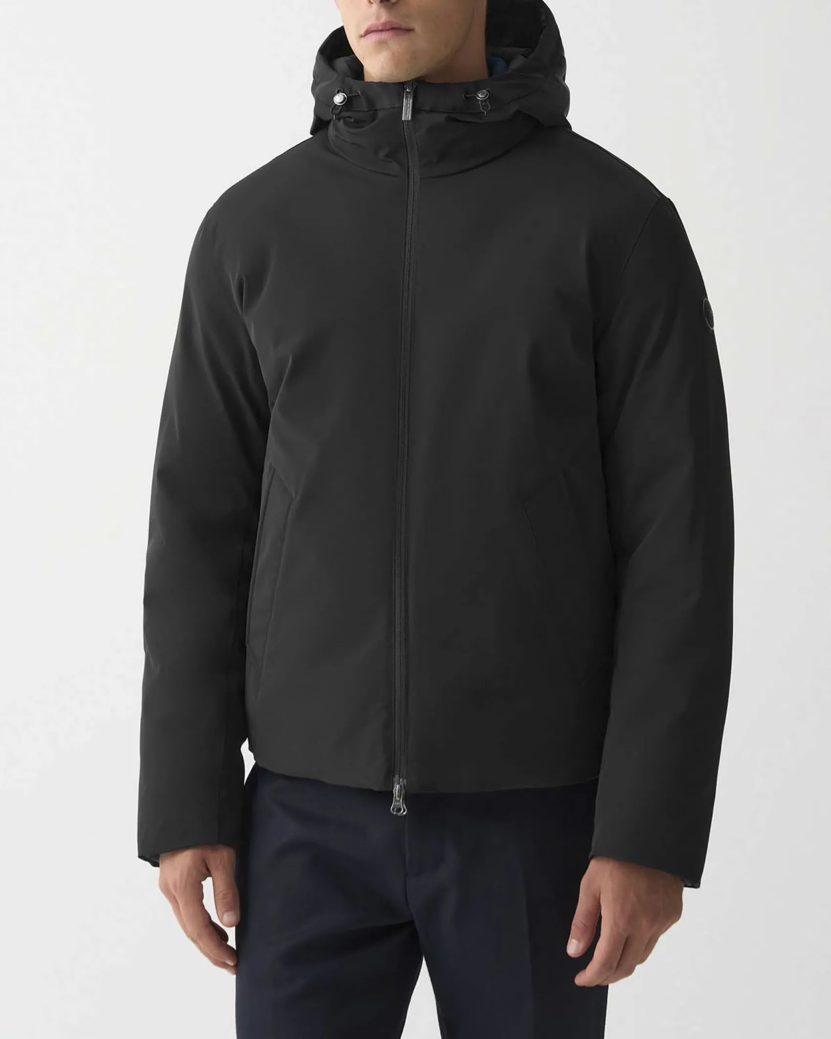 Piumino Colmar Originals nero con cappuccio in nylon opaco a trapuntatura laserata effetto spinato reversibile in parte liscia