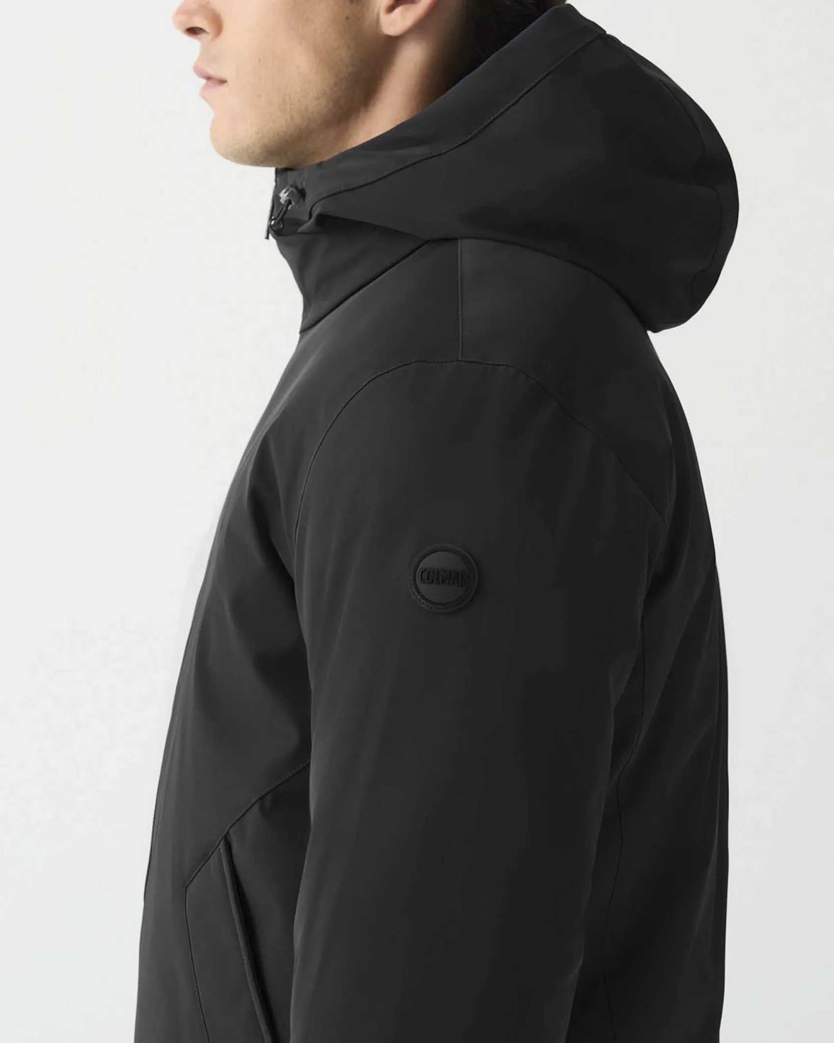 Piumino Colmar Originals nero con cappuccio in nylon opaco a trapuntatura laserata effetto spinato reversibile in parte liscia
