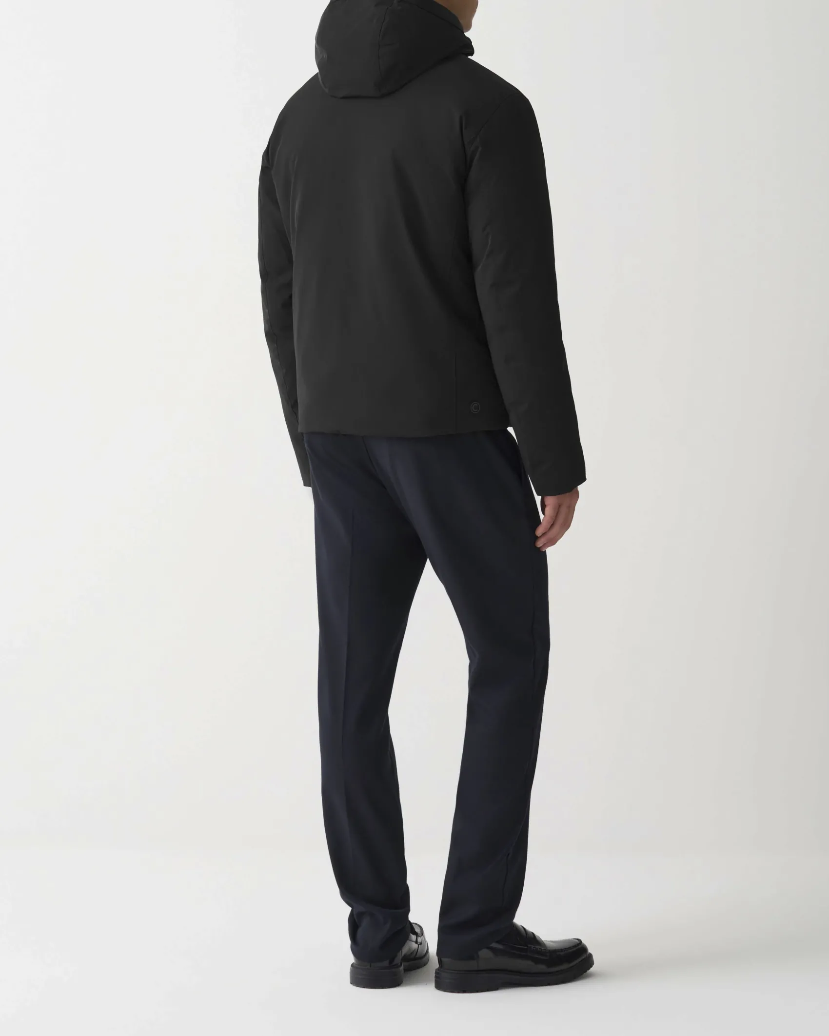 Piumino Colmar Originals nero con cappuccio in nylon opaco a trapuntatura laserata effetto spinato reversibile in parte liscia