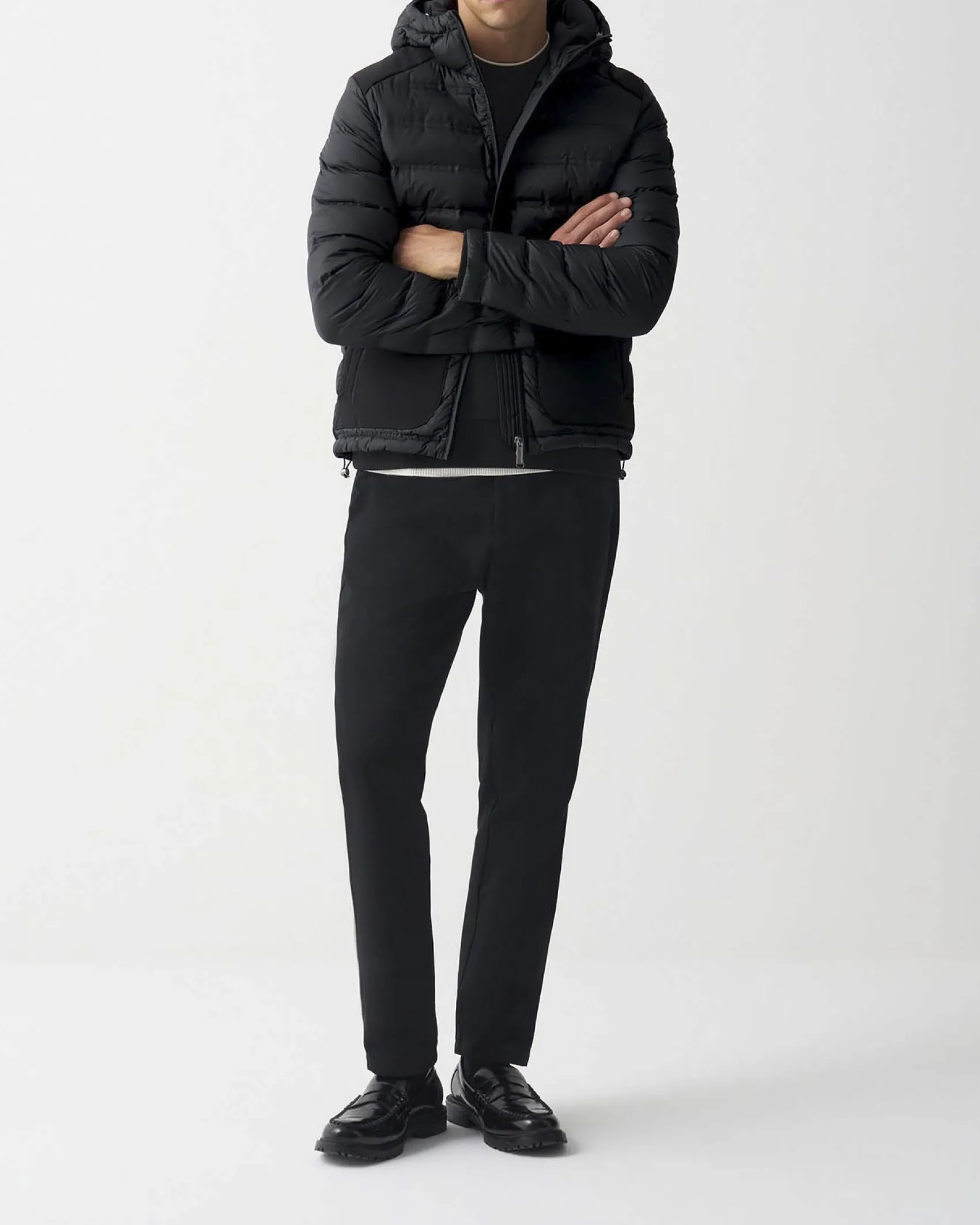 Piumino Colmar Originals nero bi-tessuto con cappuccio e inserti su spalle e tasche in tessuto stretch