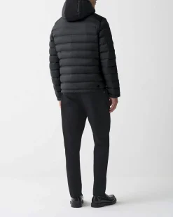 Piumino Colmar Originals nero bi-tessuto con cappuccio e inserti su spalle e tasche in tessuto stretch