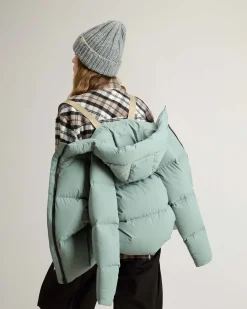 Piumino color acqua Woolrich Cloud Series in nylon elasticizzato con finish opaco con collo alto e cappuccio fisso