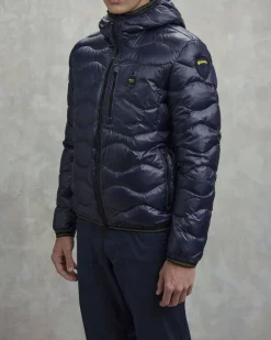 Piumino Wave Blauer blu con cappuccio fisso e trapuntatura ad onde