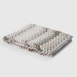 Plaids Forest in misto lana e cotone a fantasia chevron nelle nuance dell'arancio