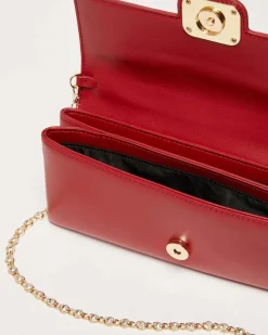 Pochette rossa Marella in similpelle liscia con fibbia logo dorata e doppia tracolla rimovibile