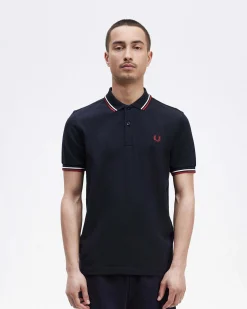 Polo blu mezza manica con bordino bianco e rosso