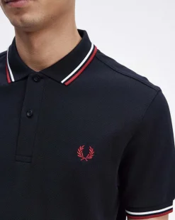 Polo blu mezza manica con bordino bianco e rosso