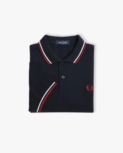 Polo blu mezza manica con bordino bianco e rosso