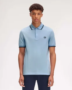Polo Fred Perry azzurra mezza manica con bordino blu e ottanio