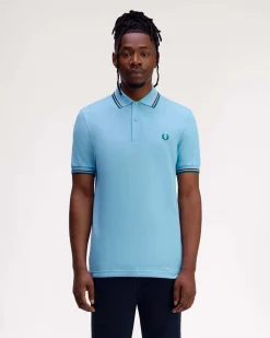Polo Fred Perry azzurra mezza manica con bordino verde e bordeaux