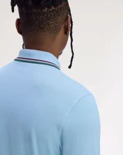 Polo Fred Perry azzurra mezza manica con bordino verde e bordeaux