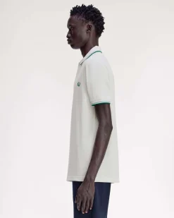 Polo Fred Perry bianca mezza manica con bordino verde e azzurro