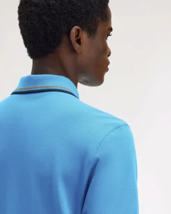 Polo Fred Perry celeste mezza manica con bordino blu e coccio
