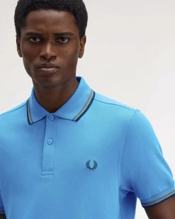 Polo Fred Perry celeste mezza manica con bordino blu e coccio