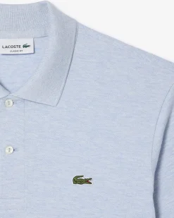 Polo Lacoste azzurro melange classic fit L.12.64 in petit piqué