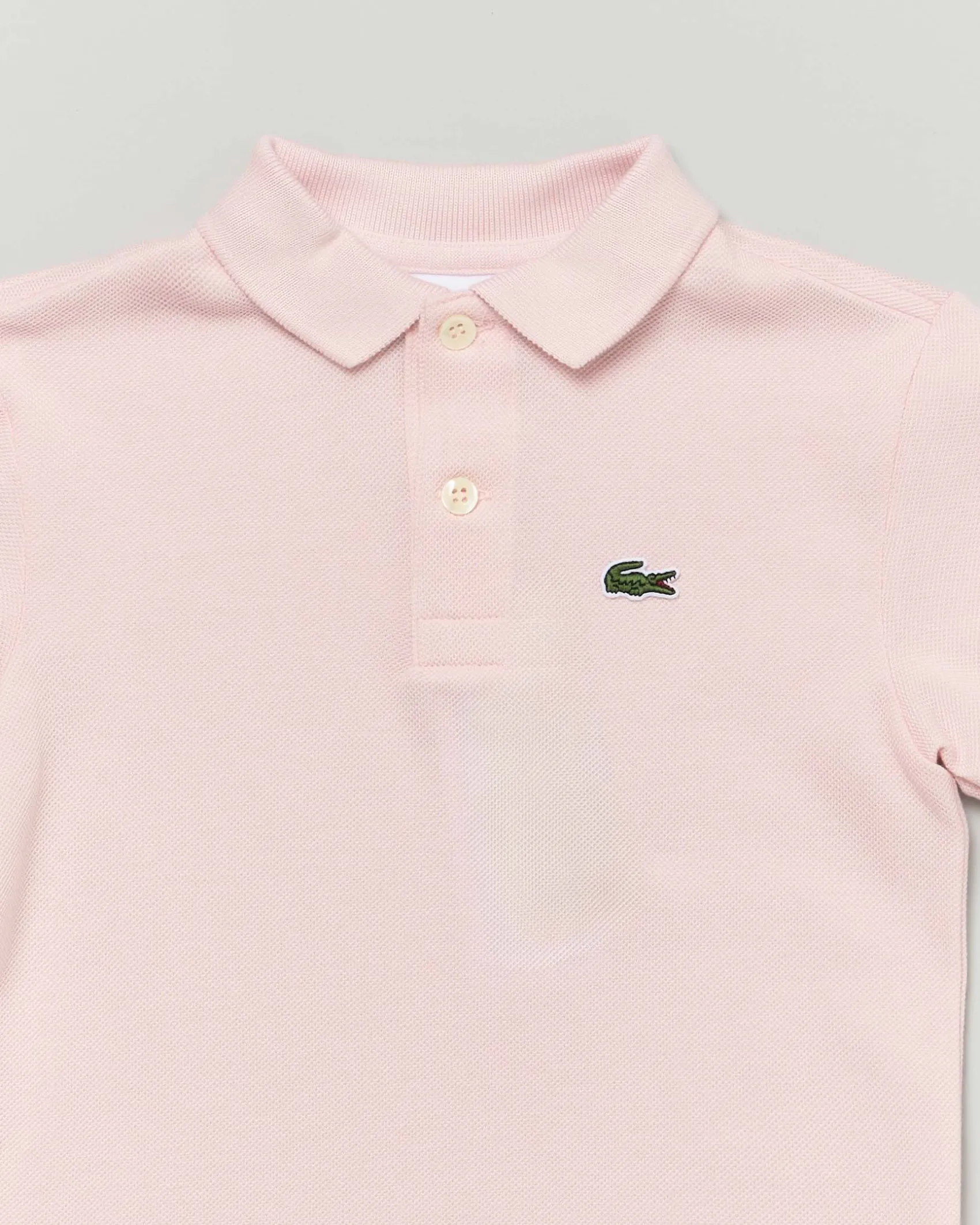 Polo Lacoste rosa piqué di puro cotone
