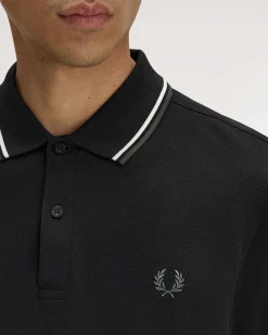 Polo manica lunga Fred Perry nera con bordino bianco e militare