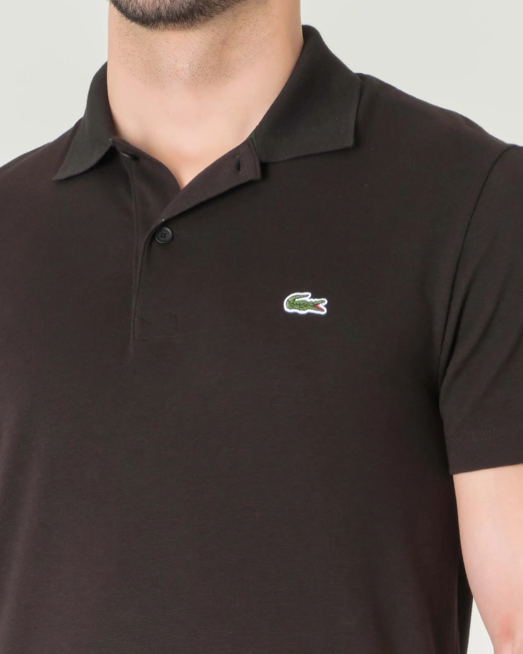 Polo mezza manica nera in cotone organico stretch punto wafer