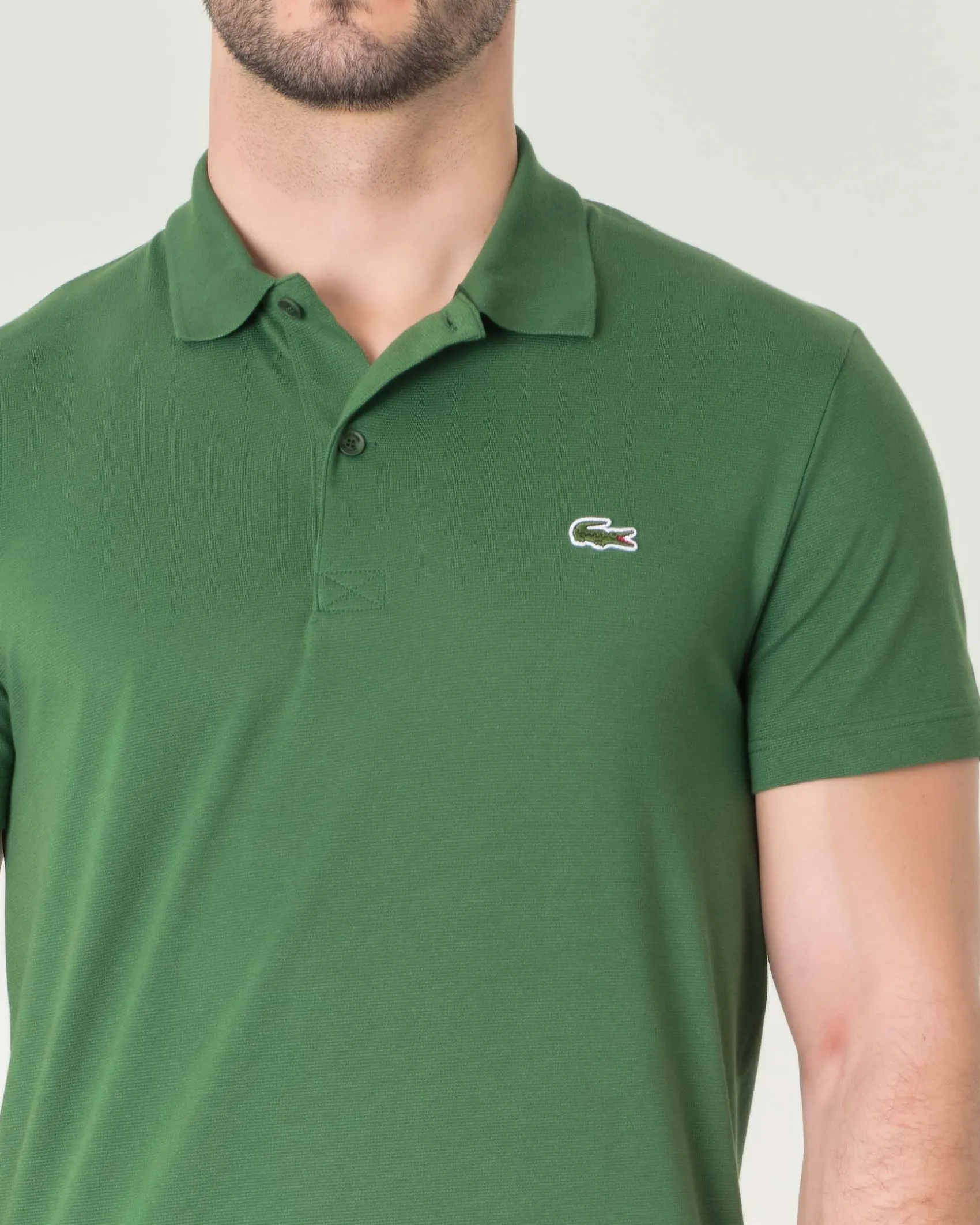 Polo mezza manica verde in cotone organico stretch punto wafer