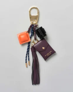 Portachiavi My Best Bag con charms a bustina bordeaux e dado smaltato nero con logo a rilievo