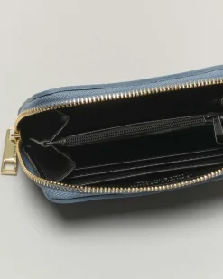 Portafoglio azzurro in pelle martellata con chiusura a cerniera