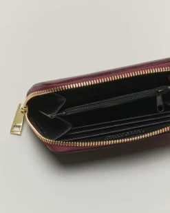 Portafoglio bordeaux in pelle martellata con chiusura a cerniera