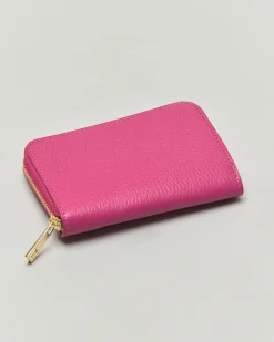 Portafoglio fucsia in pelle martellata con chiusura a cerniera