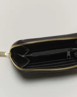 Portafoglio nero in pelle martellata con chiusura a cerniera