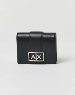 Portafoglio piccolo nero a libro Armani Exchange con fibbia logo in metallo a contrasto