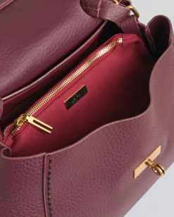 Postina Visonà bordeaux misura media in pelle martellata con chiusura a girello e tracolla più lunga